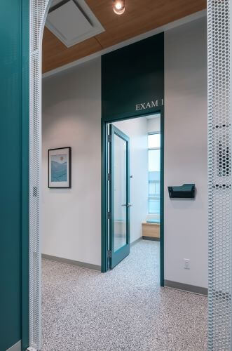 Hallway leading to a private exam room at our veterinary hospital in Kelowna