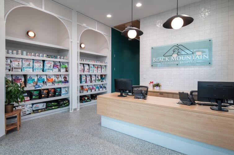 Reception desk and pet food retail display in the lobby of our veterinary hospital in Kelowna
