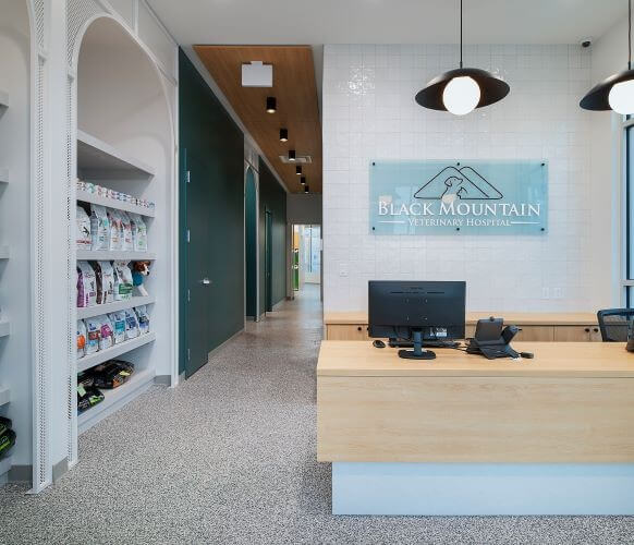 Reception desk with a hallway leading to the treatment rooms at our veterinary hospital in Kelowna
