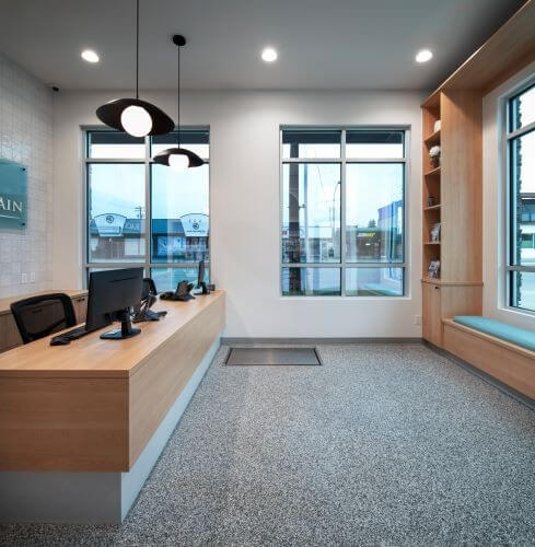 Bright reception and waiting area with large windows at our veterinary hospital in Kelowna